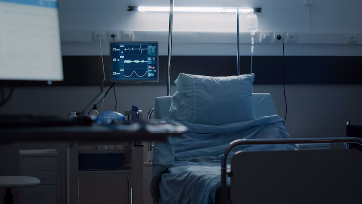 Empty hospital ward with medical equipment